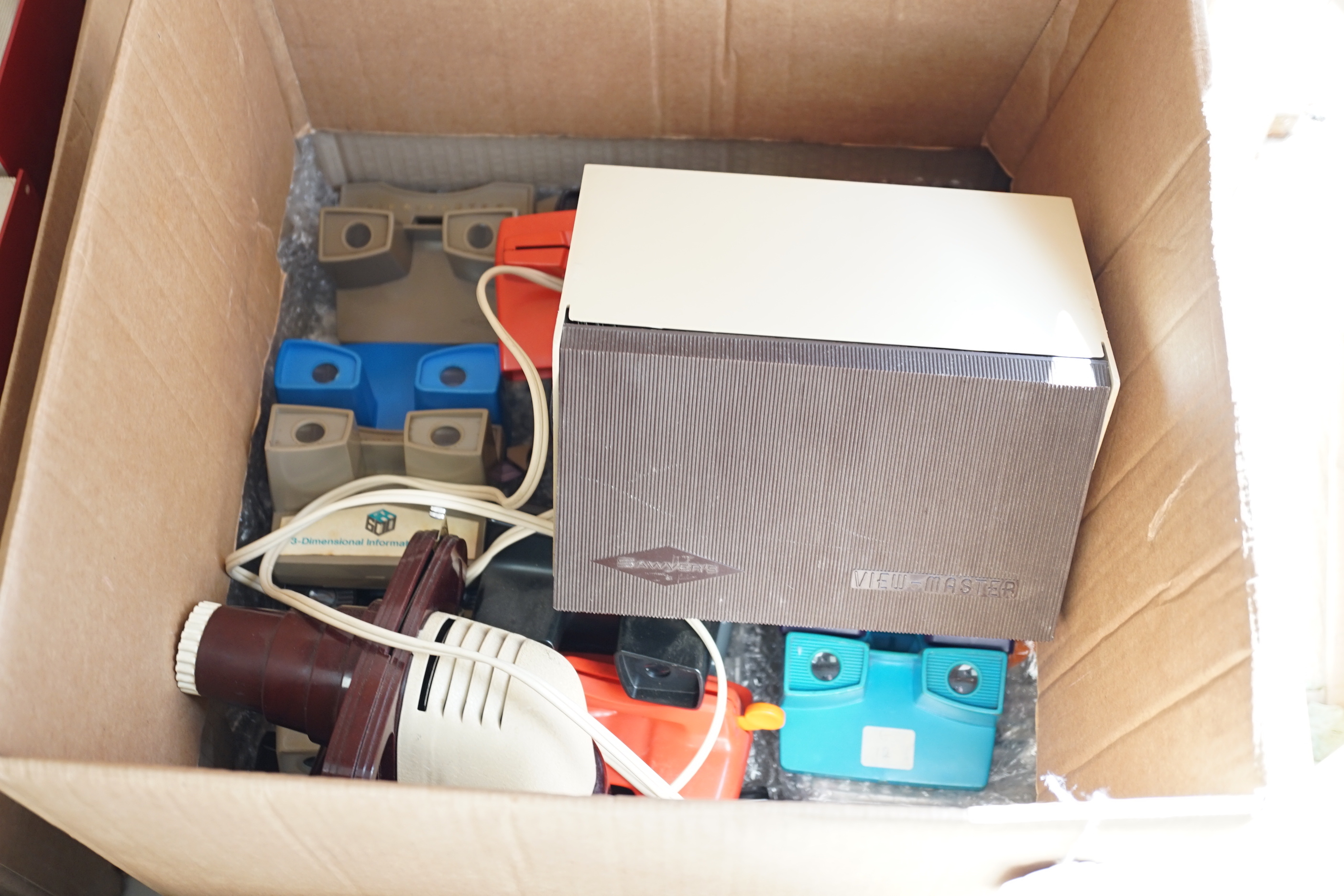 A collection of 21 View-Master viewers, including various models, a View-Master Projector and a large quantity of View-Master reels etc